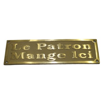 Plaque en laiton Le patron mange ici