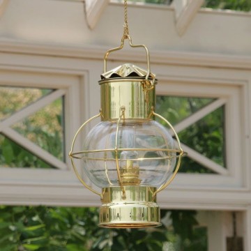 Lampe globe, en laiton poli, électrique