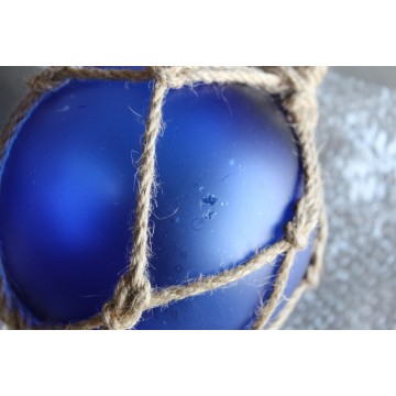 Dekorativer blauer Angelschwimmer